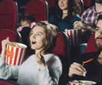 excited woman watching movie cinema В Минкульте пояснили предложения о создании ремейков советских фильмов
