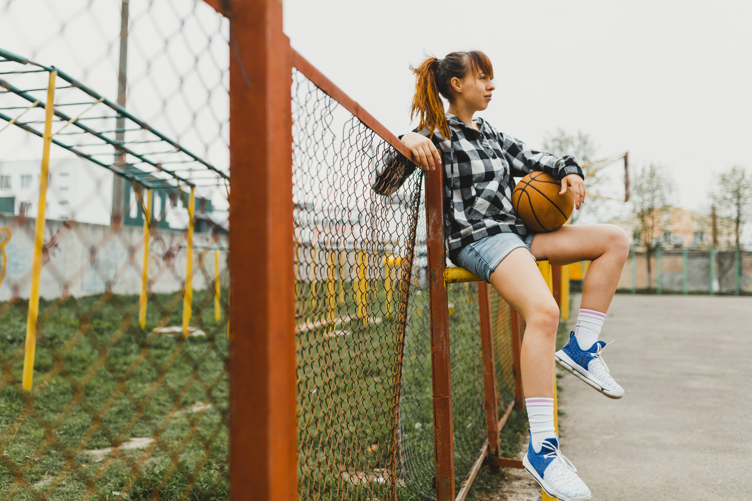 girl with basketball urban environment scaled В Берсеневской школе построили новую спортивную площадку