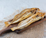 salty dried fish isolated wooden board В Мордовии двое жителей поели вяленой рыбы и заразились опасной инфекцией