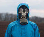 portrait ecologist working outdoors wearing gas mask uniform scientist explores surroundings scientist works open air Жителям Саранска ответили на жалобы на запахи от битумного завода