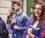 female student holding her books Мордовский госуниверситет решил увеличить до 5000 число иностранных студентов