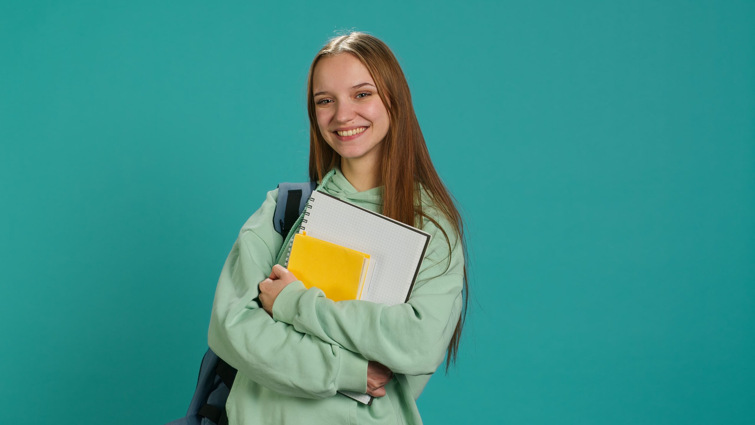 portrait jolly pupil with school supplies arms scaled В Саранске выпустили первых студентов по специальности «Биохимическое производство»